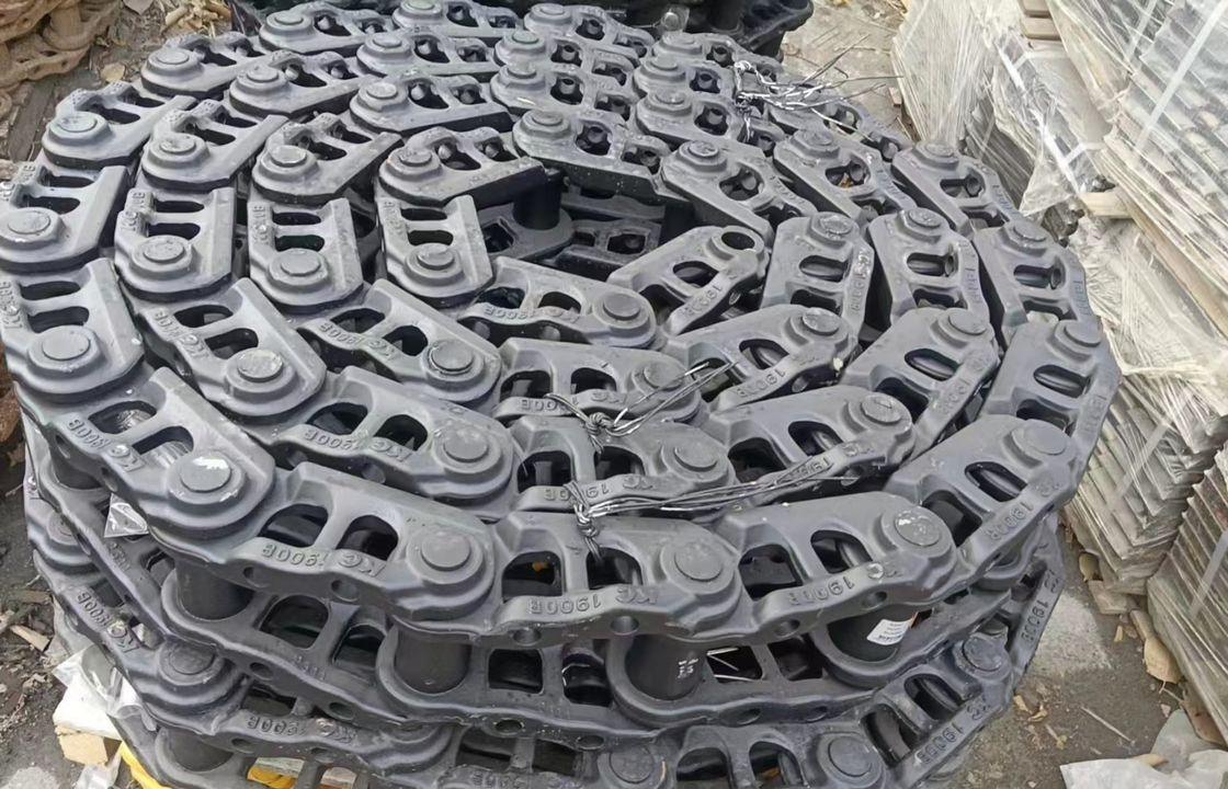 Sk200 Graafmachineonderdelen onder chassisonderdelen spoorlink spoor schoenen spoorroller bovenste bodemroller sprokcet idler